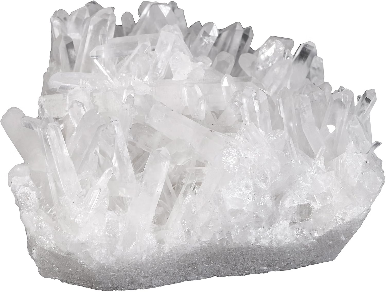 Raw clear quartz crystal cluster with dozens of pointed spires