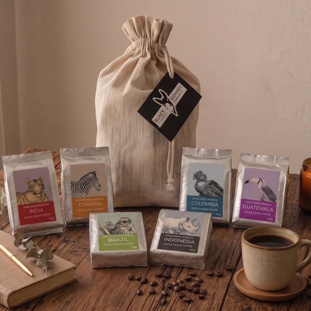 Black Donkey Coffee Roasters single-origin coffee gift set in a canvas drawstring bag, six 100g bags from Brazil, Guatemala, Colombia, India, Ethiopia, and Indonesia