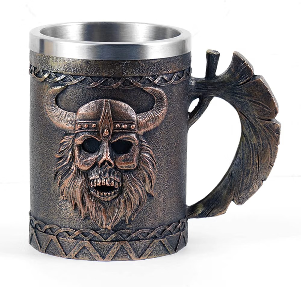 Viking skull tankard with a horned helmet, braided beard, and a driftwood-style handle, stainless steel lined
