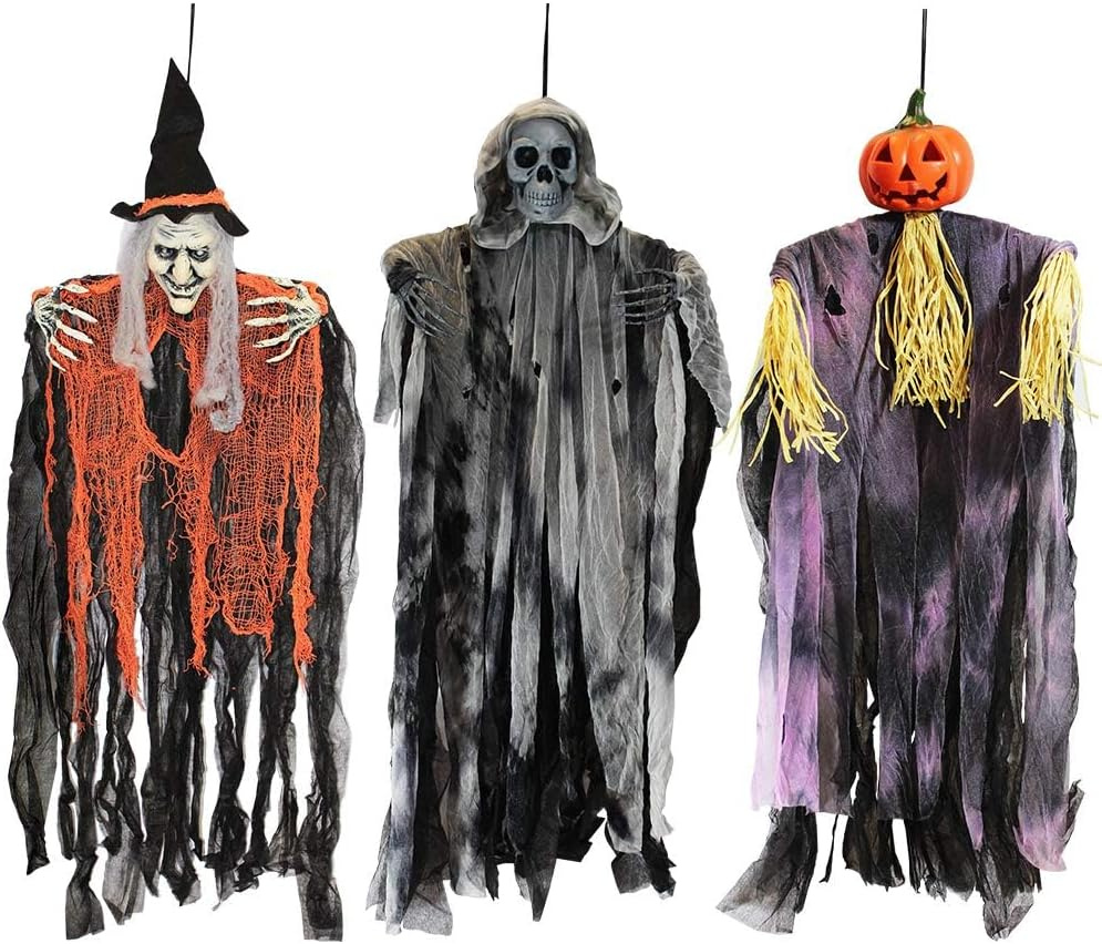 Three hanging Halloween figures dressed as a witch, grim reaper, and pumpkin scarecrow