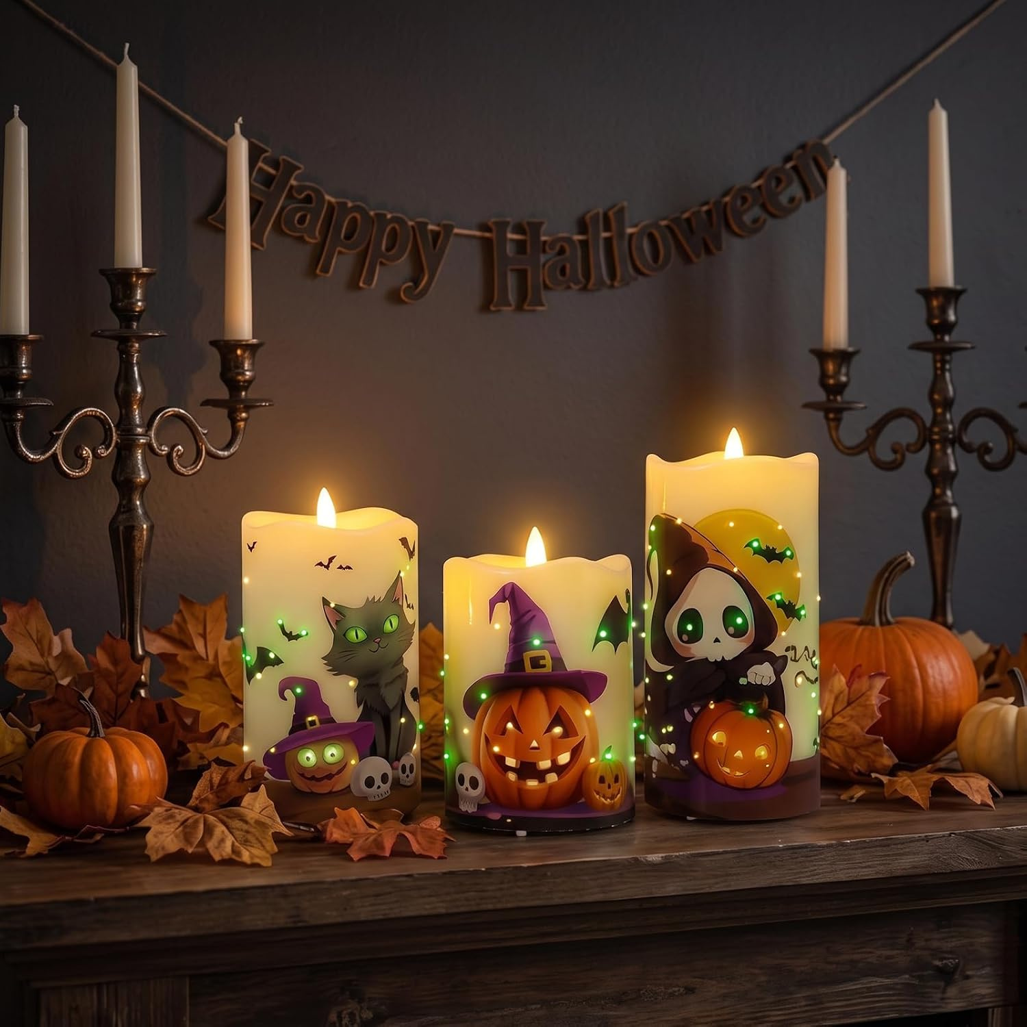 Battery LED pillar candles with Halloween ghost and pumpkin prints and a remote control