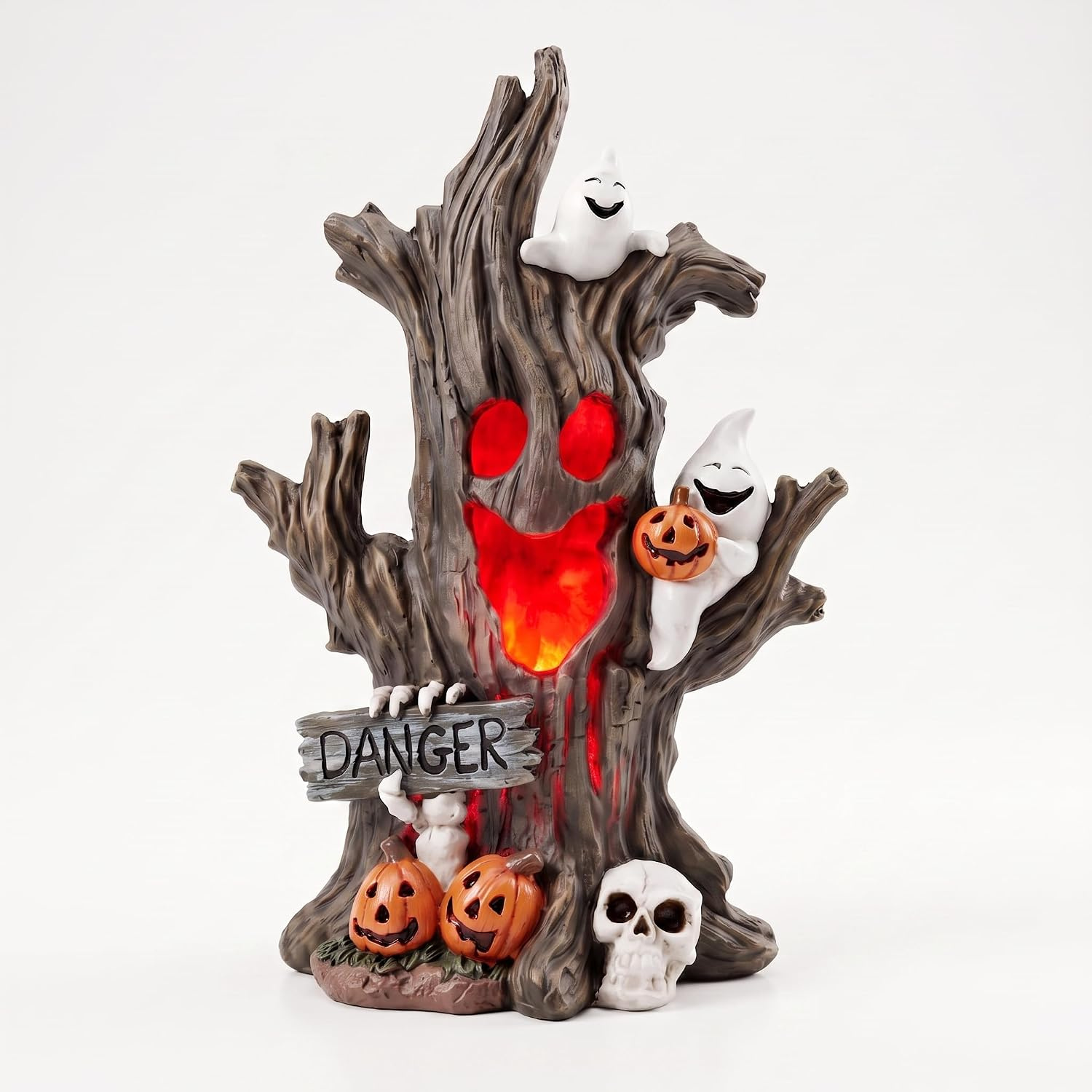 Resin Halloween tree stump ornament with ghosts, a pumpkin, a skull, and a light-up glow