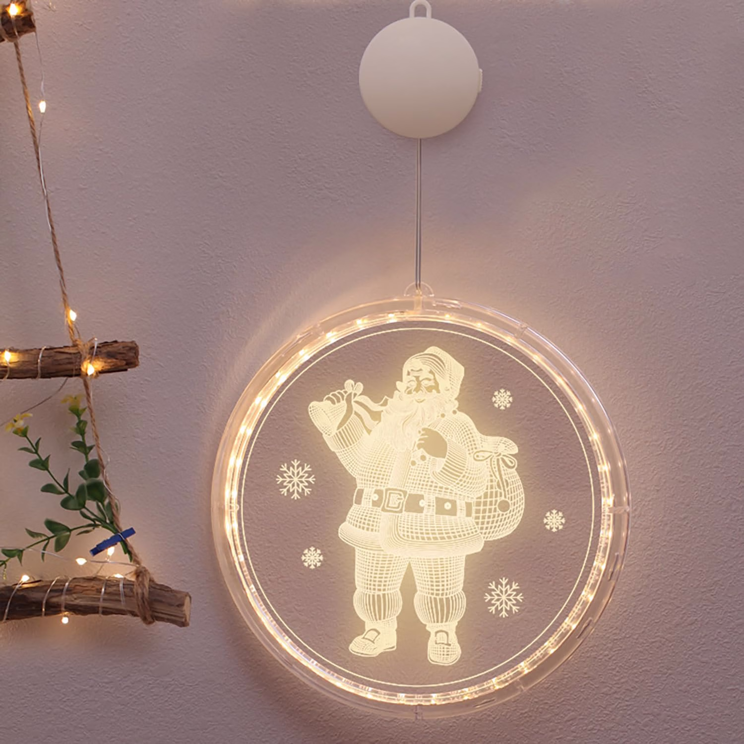 Battery-powered 3D LED Santa Claus window hanging light with snowflakes and warm fairy lights around the edge
