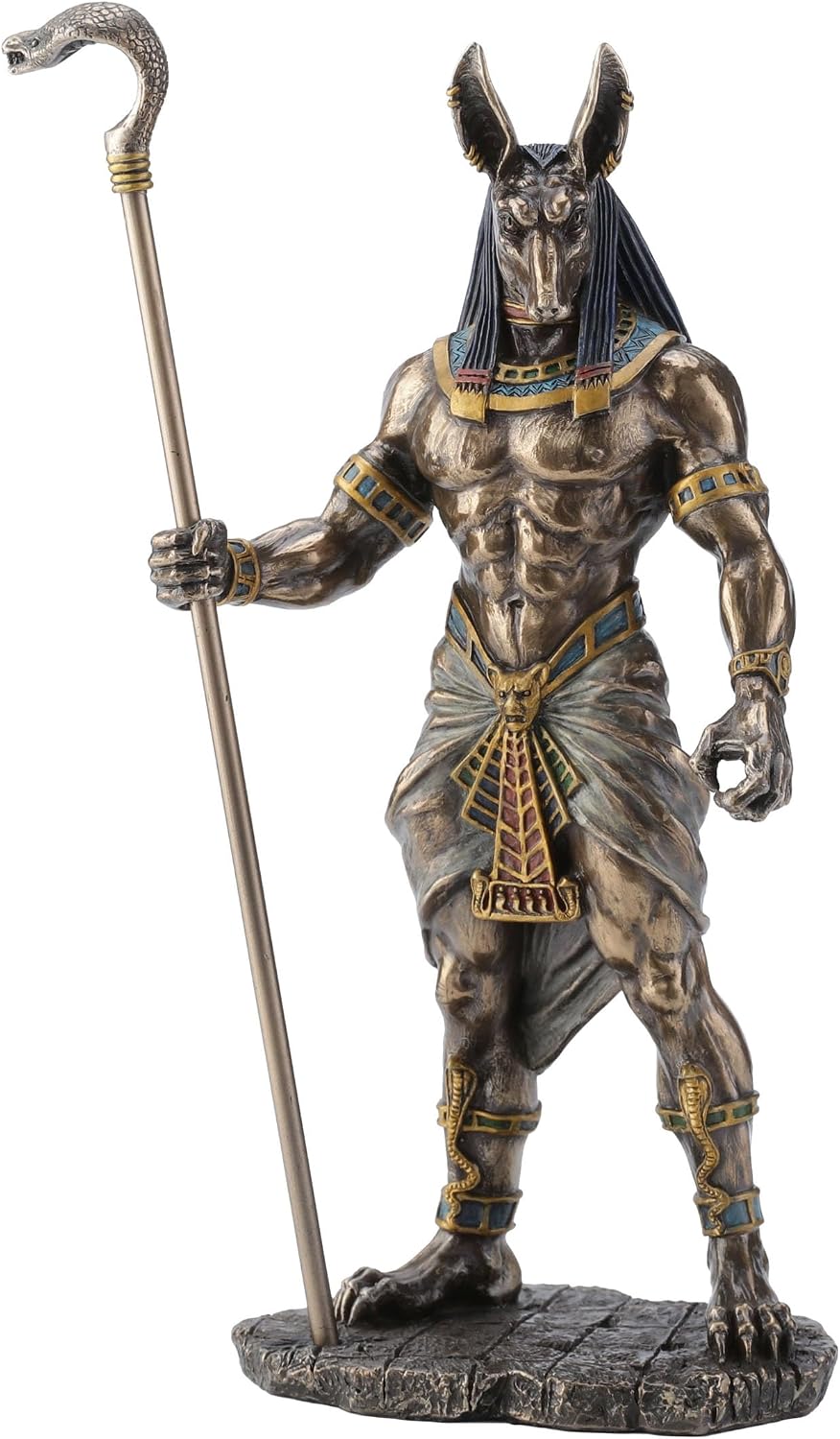 Cold-cast bronze figurine of the jackal-headed Egyptian god Anubis in a pleated kilt and collar, holding a tall cobra-headed sceptre