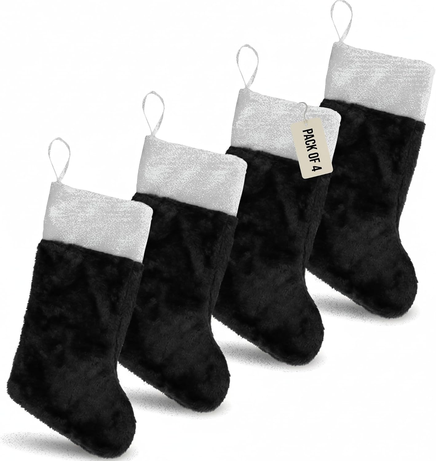 Four black plush Christmas stockings with soft white cuffs and hanging loops
