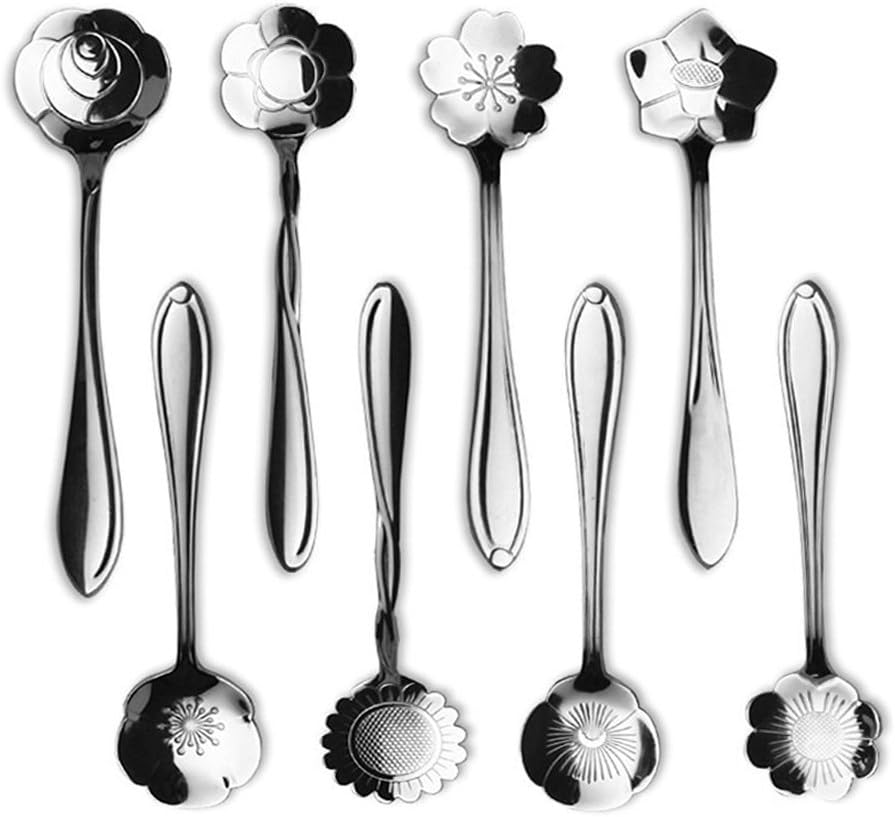 Eight polished stainless steel teaspoons each with a different flower-shaped bowl, including rose, sakura and sunflower