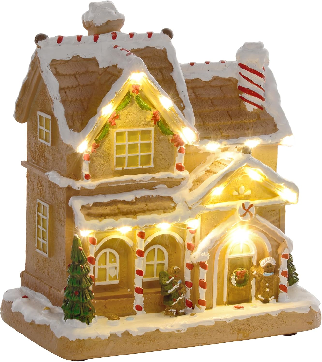 Light-up gingerbread house ornament with snowy icing on the roof, candy-cane pillars, warm white fairy lights along the eaves, and gingerbread figures by the door