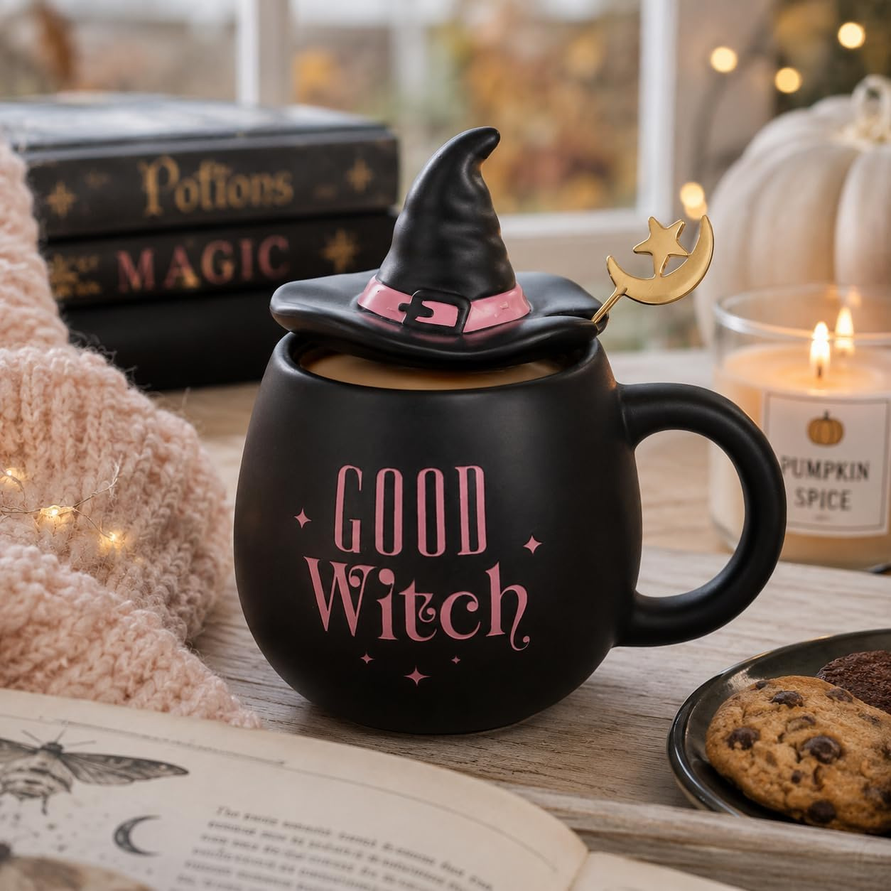 Black ceramic Good Witch mug with witch hat lid and gold-tone spoon