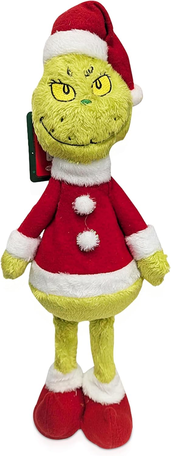 Tall plush Grinch standing figure in a red Santa suit and hat with white fur trim, wearing his trademark sly grin
