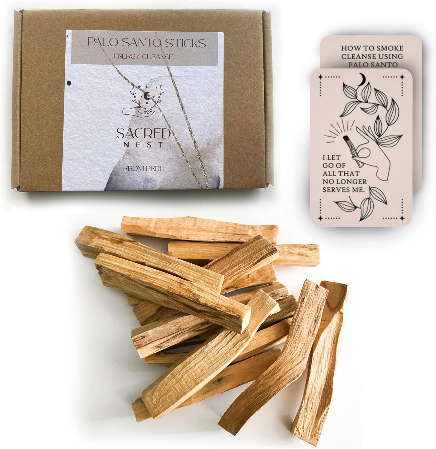 Box of Sacred Nest palo santo sticks with a ritual card, and a loose pile of pale palo santo wood sticks