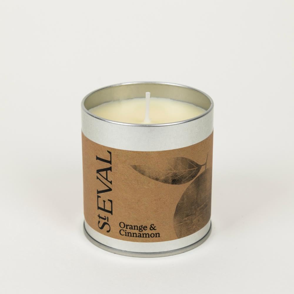 St Eval orange and cinnamon scented candle in an illustrated tin