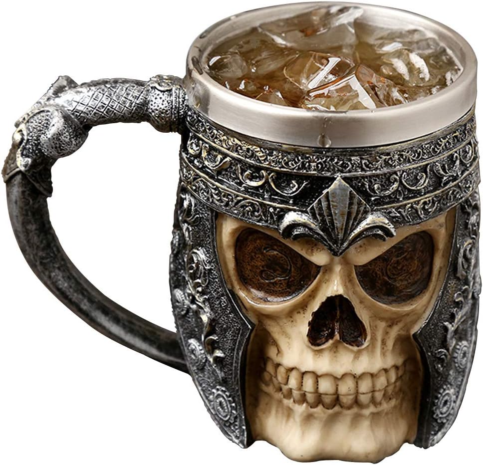 Resin mug shaped like a skull in a Viking warrior helmet, with a stainless steel lining and a carved handle