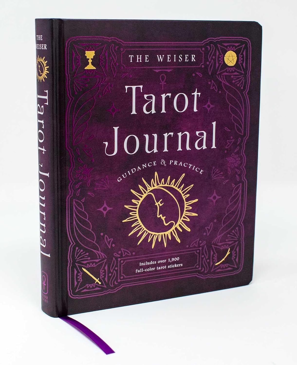 Purple hardback Weiser Tarot Journal with a gold sun-and-moon design and a ribbon marker