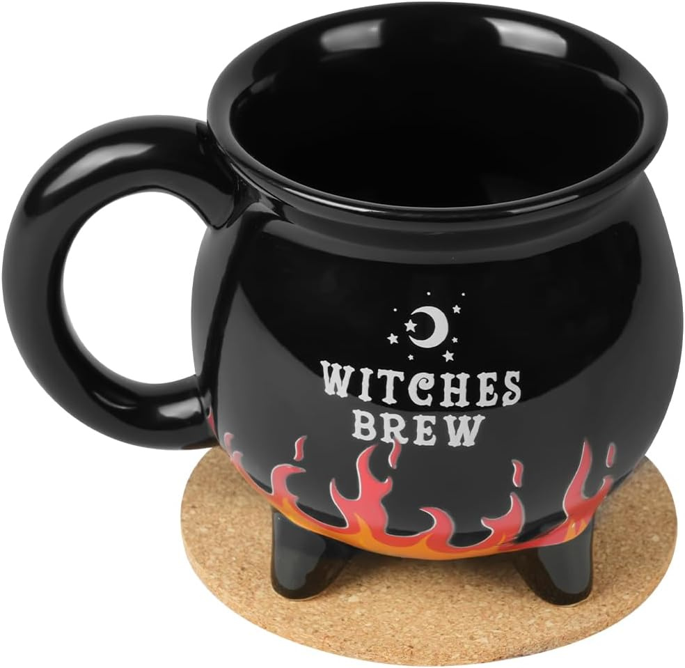 Black ceramic cauldron mug with clawed feet, flame-licked base, and cork coaster